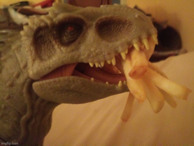 Indominus Rex eating french fries from McDonald's | made w/ Imgflip meme maker