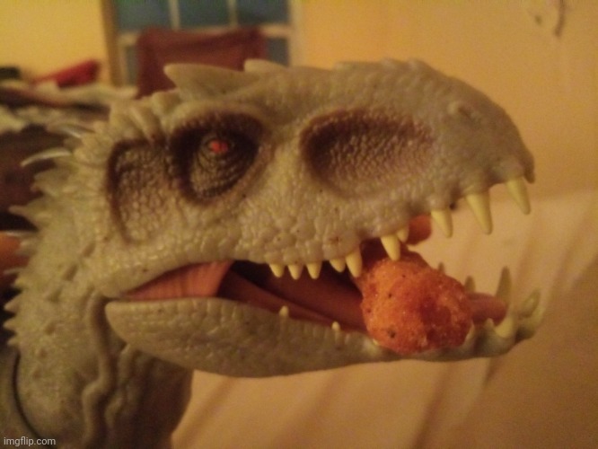 Indominus Rex eating a chicken fry from Burger King | image tagged in jurassic park,jurassic world | made w/ Imgflip meme maker