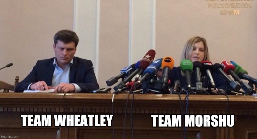 Doesn't this meme prove how underrated Team Wheatley is? | TEAM MORSHU; TEAM WHEATLEY | image tagged in man and woman microphone | made w/ Imgflip meme maker