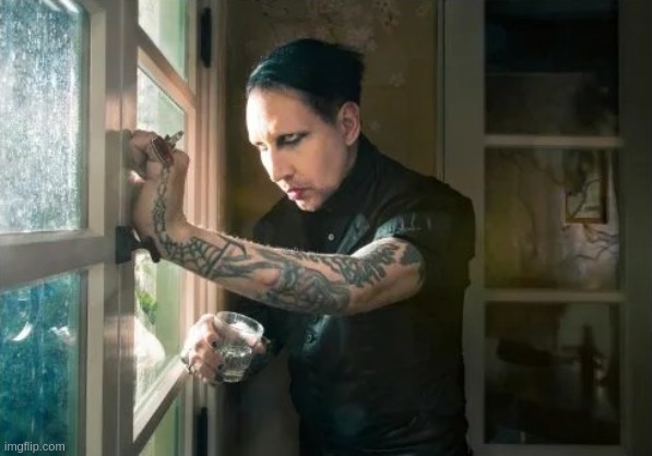 Marilyn Manson waiting | image tagged in marilyn manson waiting | made w/ Imgflip meme maker