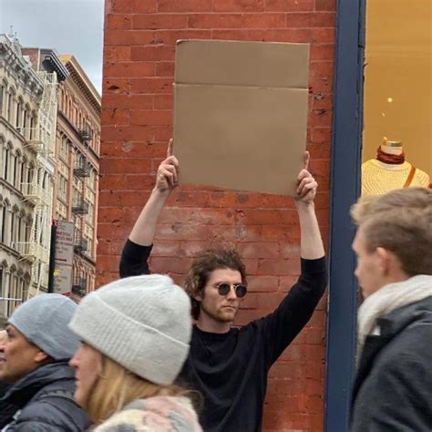 Man Holding Cardboard Sign Blank Meme Template