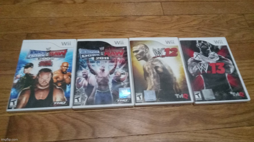 They actually made WWE games for the WII, here's a few that I have. | image tagged in wwe,games | made w/ Imgflip meme maker