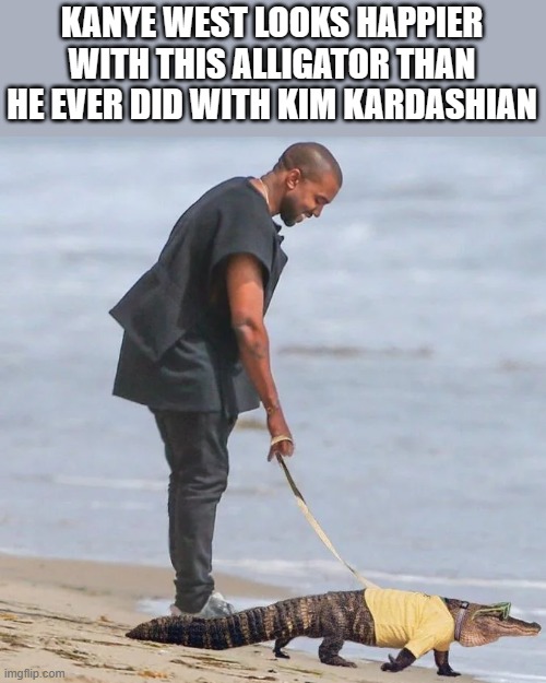 Kanye West Looks Happier With This Alligator | KANYE WEST LOOKS HAPPIER WITH THIS ALLIGATOR THAN HE EVER DID WITH KIM KARDASHIAN | image tagged in kanye west,kanye west lol,alligator,kim kardashian,funny,memes | made w/ Imgflip meme maker