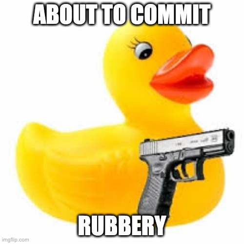 Rubber Ducky Glock | ABOUT TO COMMIT; RUBBERY | image tagged in rubber ducky glock | made w/ Imgflip meme maker