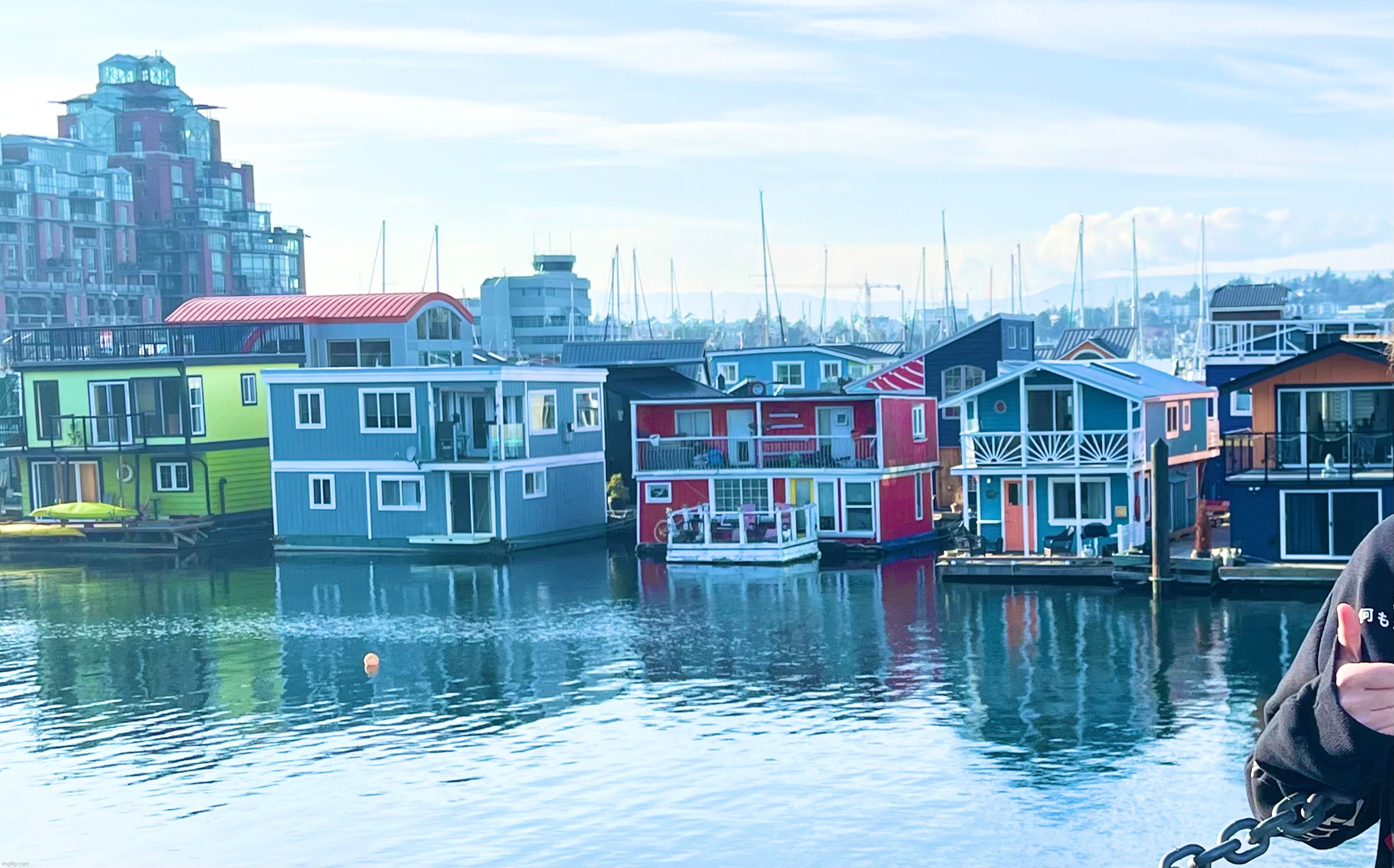 Boathouses on the water! | image tagged in ocean,cool,pretty,blue,water,photos | made w/ Imgflip meme maker