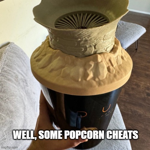 Dune popcorn bucket | WELL, SOME POPCORN CHEATS | image tagged in dune popcorn bucket | made w/ Imgflip meme maker