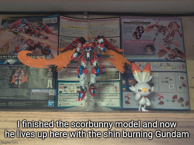 There were a ton of stickers on the ears which are DEFINITELY getting painted if I make it into a Gundam | I finished the scorbunny model and now he lives up here with the shin burning Gundam | made w/ Imgflip meme maker