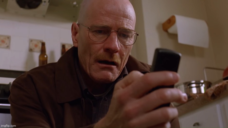 Walter White on his Phone | image tagged in walter white on his phone | made w/ Imgflip meme maker
