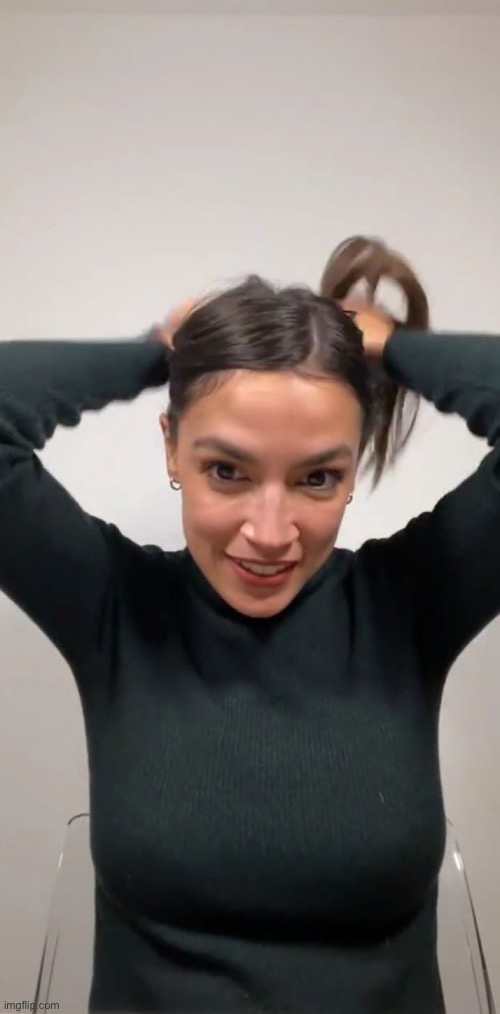 AOC Tying Her Hair | image tagged in aoc tying her hair | made w/ Imgflip meme maker
