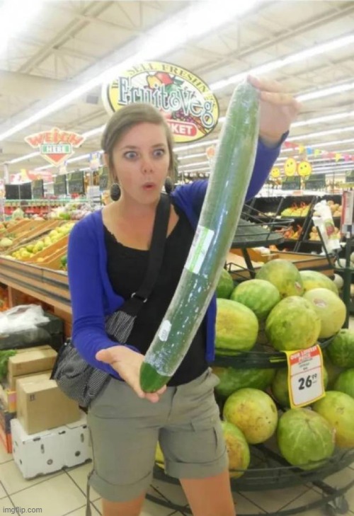 A rather large cucumber | image tagged in a rather large cucumber | made w/ Imgflip meme maker