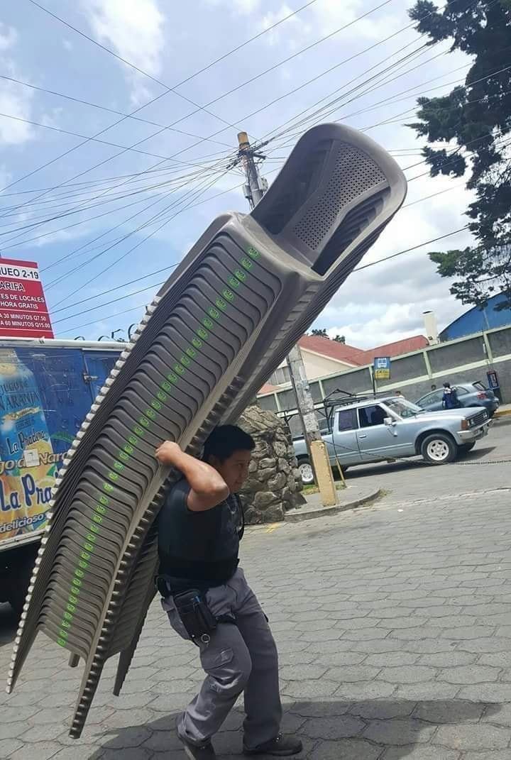 man carrying chairs Blank Meme Template