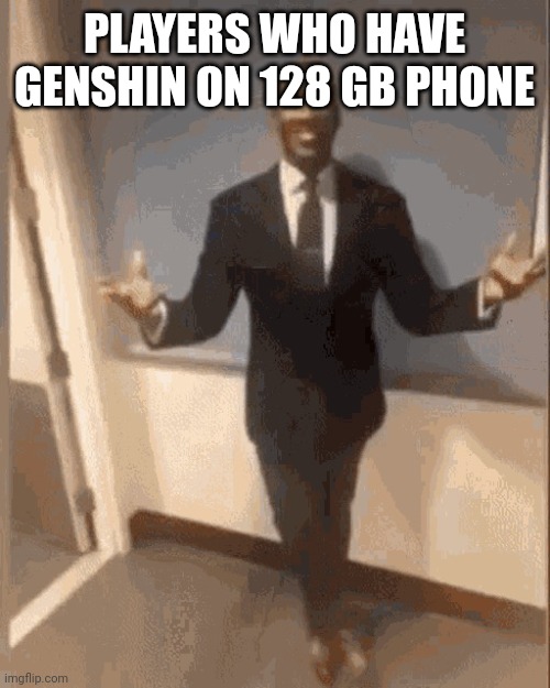 smiling black guy in suit | PLAYERS WHO HAVE GENSHIN ON 128 GB PHONE | image tagged in smiling black guy in suit | made w/ Imgflip meme maker