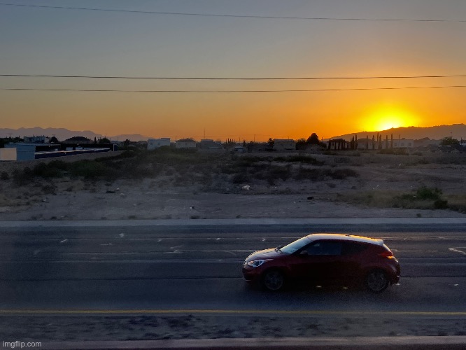 Sunset on the road | image tagged in sunset | made w/ Imgflip meme maker