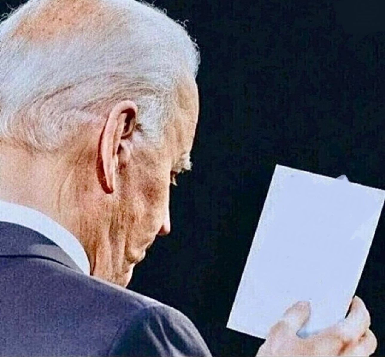 Biden reading a note on a piece of paper Blank Meme Template