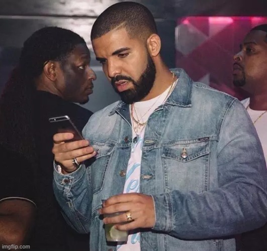 Drake looking at phone upset | image tagged in drake looking at phone upset | made w/ Imgflip meme maker