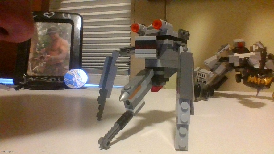Heres a Lego Droid Strider I made that goes with the other Lego droids I made (also nose reveal lol) | made w/ Imgflip meme maker