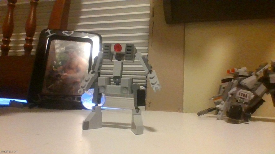 Here is my Spy droid that belongs with the other Lego droids I made. Pretty underwhelming but hey it can hold stuff | made w/ Imgflip meme maker