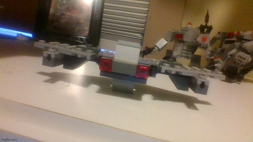 Heres a droid jet fighter I made that's the last of the lego built droids. | made w/ Imgflip meme maker