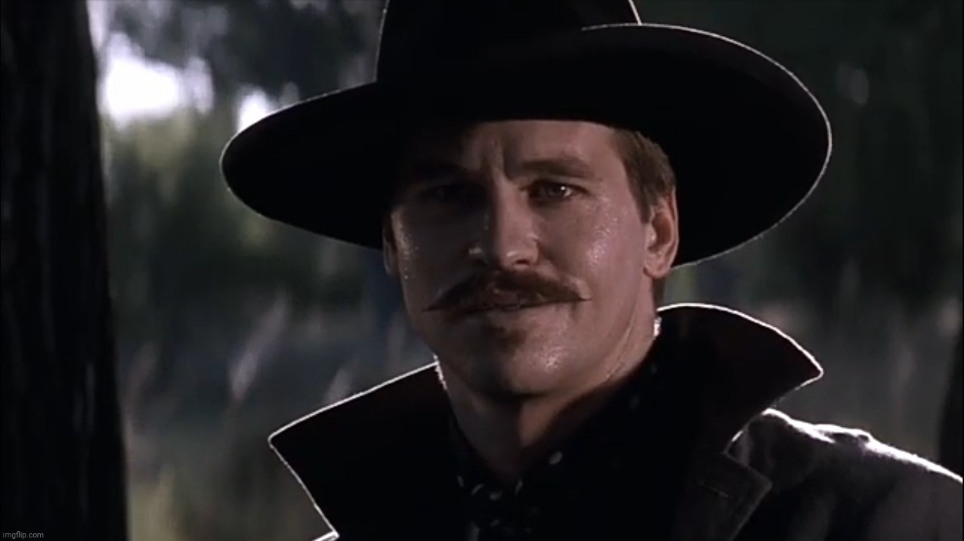 I'm your huckleberry, Doc Holliday, Tombstone | image tagged in tombstone,doc holliday,i'm your huckleberry,i beg to differ,i wasn't,val kilmer | made w/ Imgflip meme maker