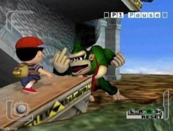 Donkey Kong flipping off Ness | image tagged in donkey kong flipping off ness | made w/ Imgflip meme maker