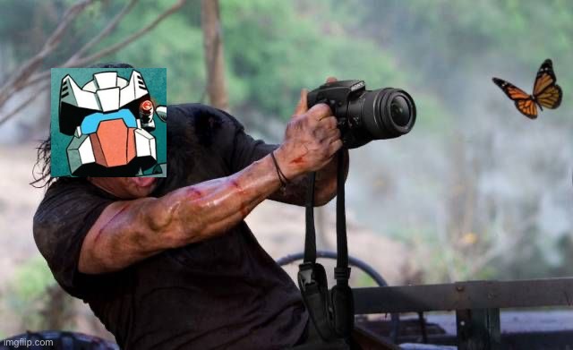 Rewind every 5 seconds: | image tagged in rambo photographer,transformers idw,transformers | made w/ Imgflip meme maker