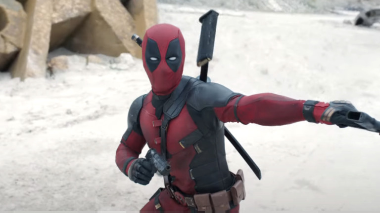 Deadpool reloads pistols Blank Meme Template