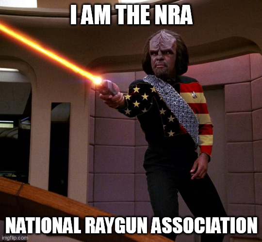 Worf is the National Raygun Association | I AM THE NRA; NATIONAL RAYGUN ASSOCIATION | image tagged in worf wearing an american flag | made w/ Imgflip meme maker