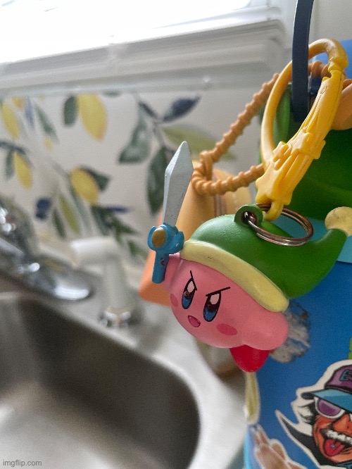 Kirby keychain I have on my water bottle | image tagged in image,kirby | made w/ Imgflip meme maker