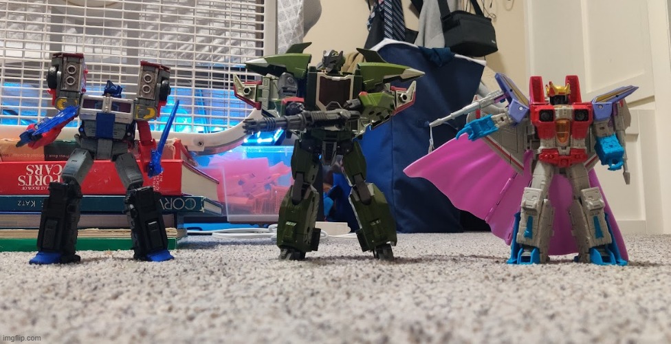 my 3 transformers figures (from left to right): G2 laser Optimus Prime, TF Prime Skyquake, and G1 Coronation Starscream | made w/ Imgflip meme maker