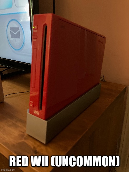 rate my wii (hacked) | RED WII (UNCOMMON) | image tagged in wii | made w/ Imgflip meme maker