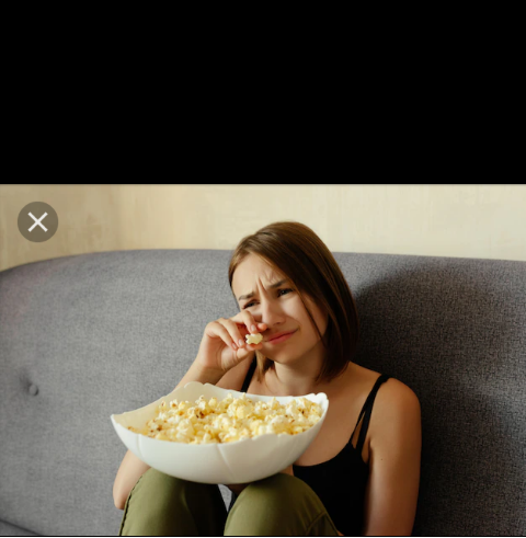 Woman Eating popcorn and crying. Blank Meme Template