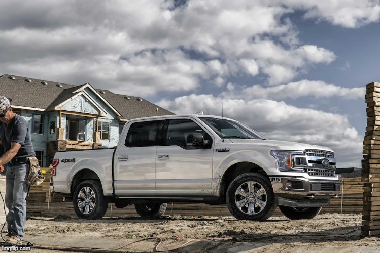 This badass picture of a 2019 Ford F150 XLT carrying a house | image tagged in this badass picture of a 2019 ford f150 xlt carrying a house | made w/ Imgflip meme maker