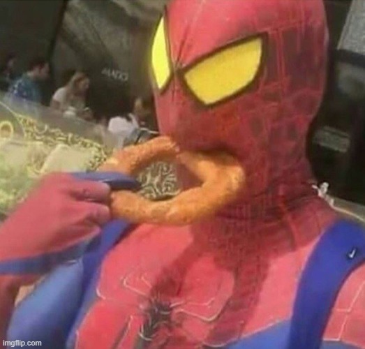 Spiderman Eating Donut | image tagged in spiderman eating donut | made w/ Imgflip meme maker