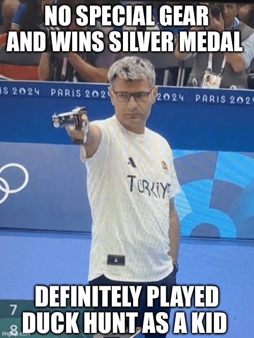 Turkish Silver | NO SPECIAL GEAR AND WINS SILVER MEDAL; DEFINITELY PLAYED DUCK HUNT AS A KID | image tagged in 2024,turkish,olympics,silver medal,shooter | made w/ Imgflip meme maker