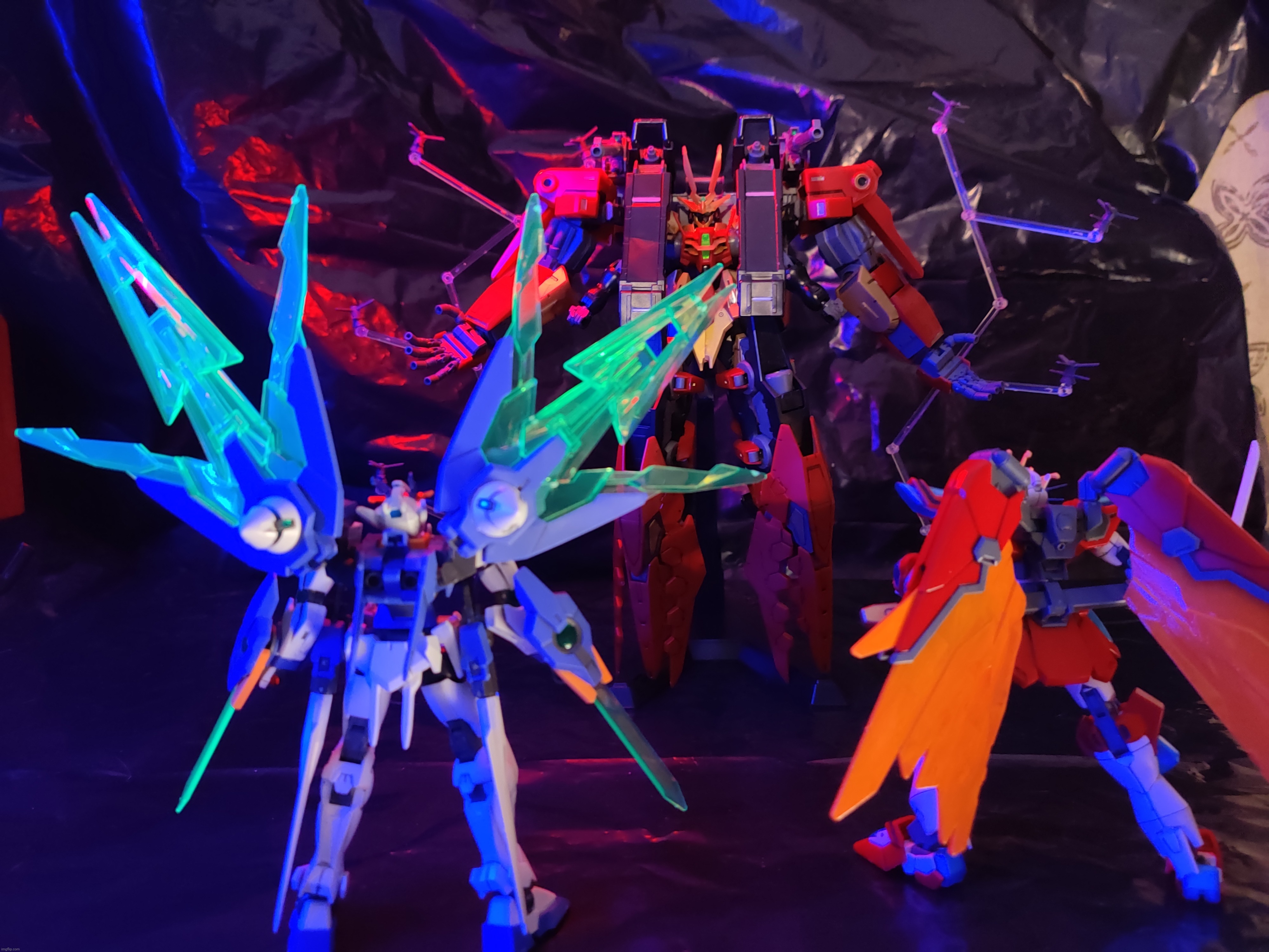 A bit of late-night gunpla photography with my three build metaverse kits | made w/ Imgflip meme maker