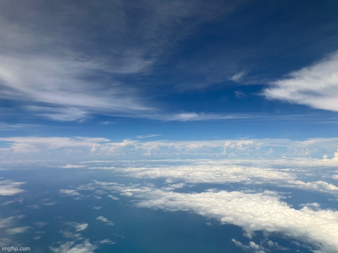 Erm people are posting pics of the sky? Here is a picture of the sky while flying over the gulf of mexico | made w/ Imgflip meme maker