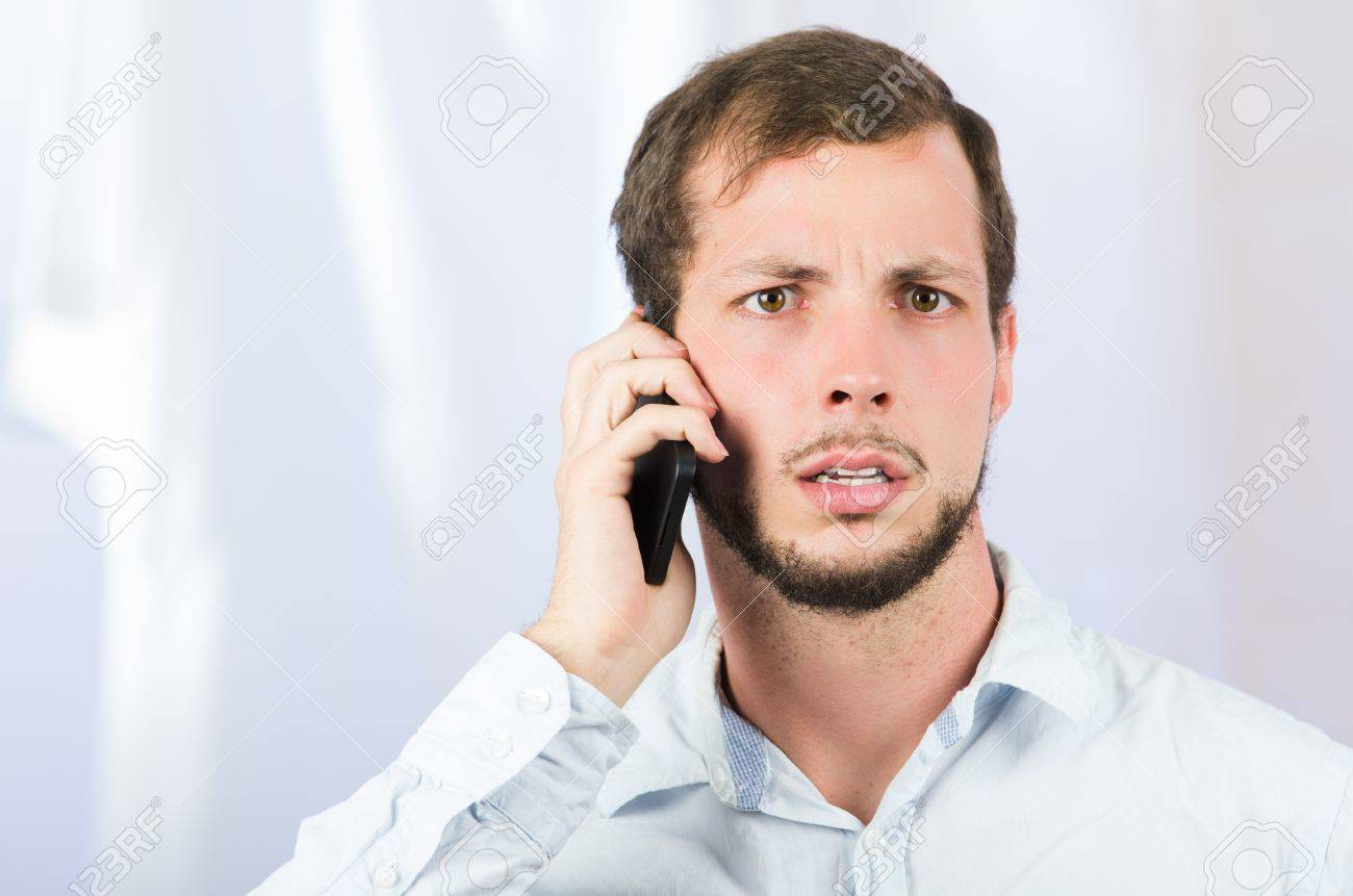 High Quality Concerned man holding phone to ear Blank Meme Template