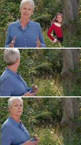 High Quality jamie lee curtis something hiding behind tree Blank Meme Template