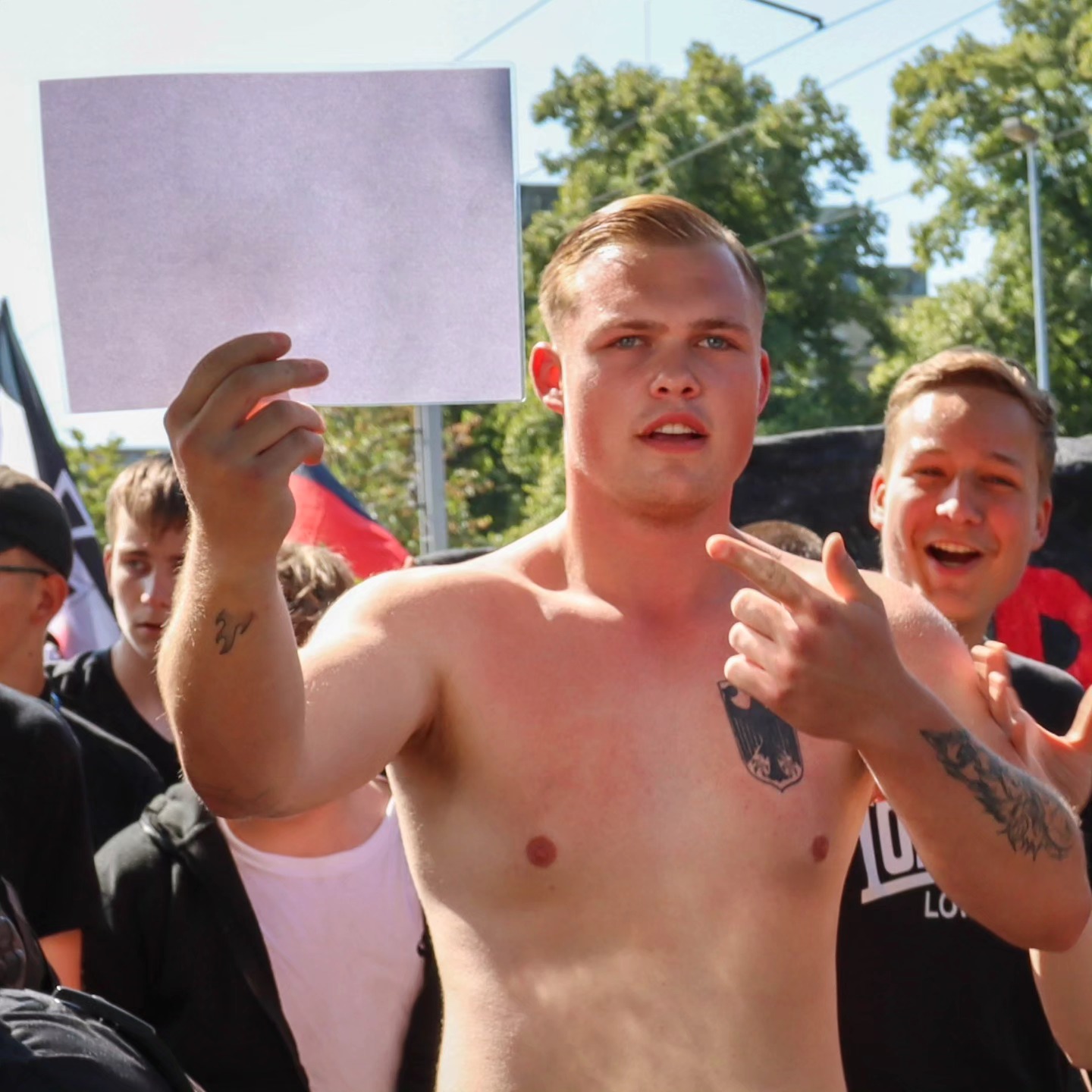 German Nazi with sign. Blank Meme Template