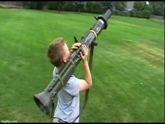 Missile launcher kid | image tagged in missile launcher kid | made w/ Imgflip meme maker