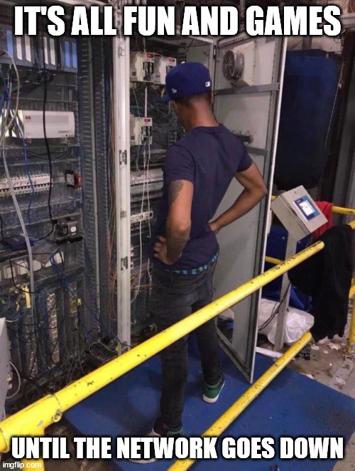 OneDrive For The Win! | IT'S ALL FUN AND GAMES; UNTIL THE NETWORK GOES DOWN | image tagged in network engineer looking at server rack,outage,outrage,network | made w/ Imgflip meme maker