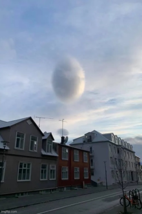 Why does that cloud look likean egg | image tagged in memes,clouds | made w/ Imgflip meme maker