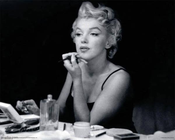 Marilyn Monroe Applying Lipstick | image tagged in marilyn monroe applying lipstick | made w/ Imgflip meme maker