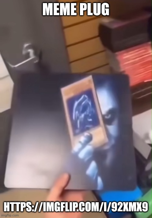 Joker holding the Blue Eyes White Dragon card | MEME PLUG; HTTPS://IMGFLIP.COM/I/92XMX9 | image tagged in joker holding the blue eyes white dragon card | made w/ Imgflip meme maker