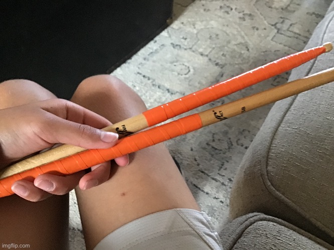 Taped some old drum set sticks orange for no reason | made w/ Imgflip meme maker