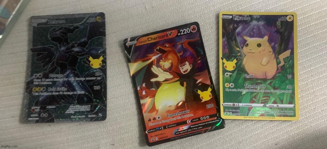 I went in the basement looking for a book and found 3 cases of Pokémon cards, one of them had these | made w/ Imgflip meme maker