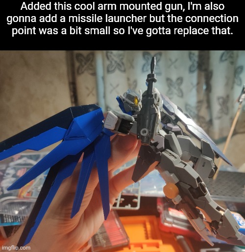 Looking pretty good so far, the missile launcher and arm mounted gun are mainly so I have some extra options when posing this | Added this cool arm mounted gun, I'm also gonna add a missile launcher but the connection point was a bit small so I've gotta replace that. | made w/ Imgflip meme maker