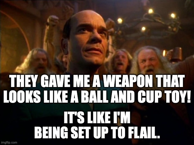 EMH in Viking Hall | THEY GAVE ME A WEAPON THAT LOOKS LIKE A BALL AND CUP TOY! IT'S LIKE I'M BEING SET UP TO FLAIL. | image tagged in emh,vikings | made w/ Imgflip meme maker