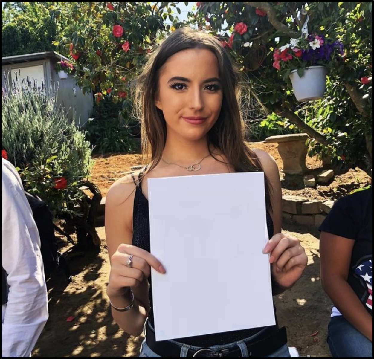 Ashley St. Clair Holding Sign #3 Blank Meme Template