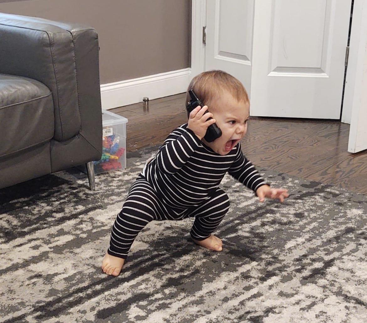 Baby yelling into phone Blank Meme Template